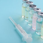 syringe and vialsof clear liquid