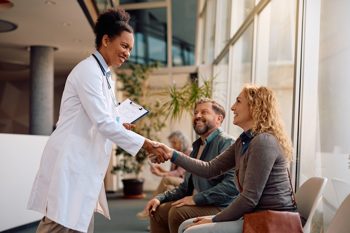 Doctor meeting with a patient for treatment in MA.